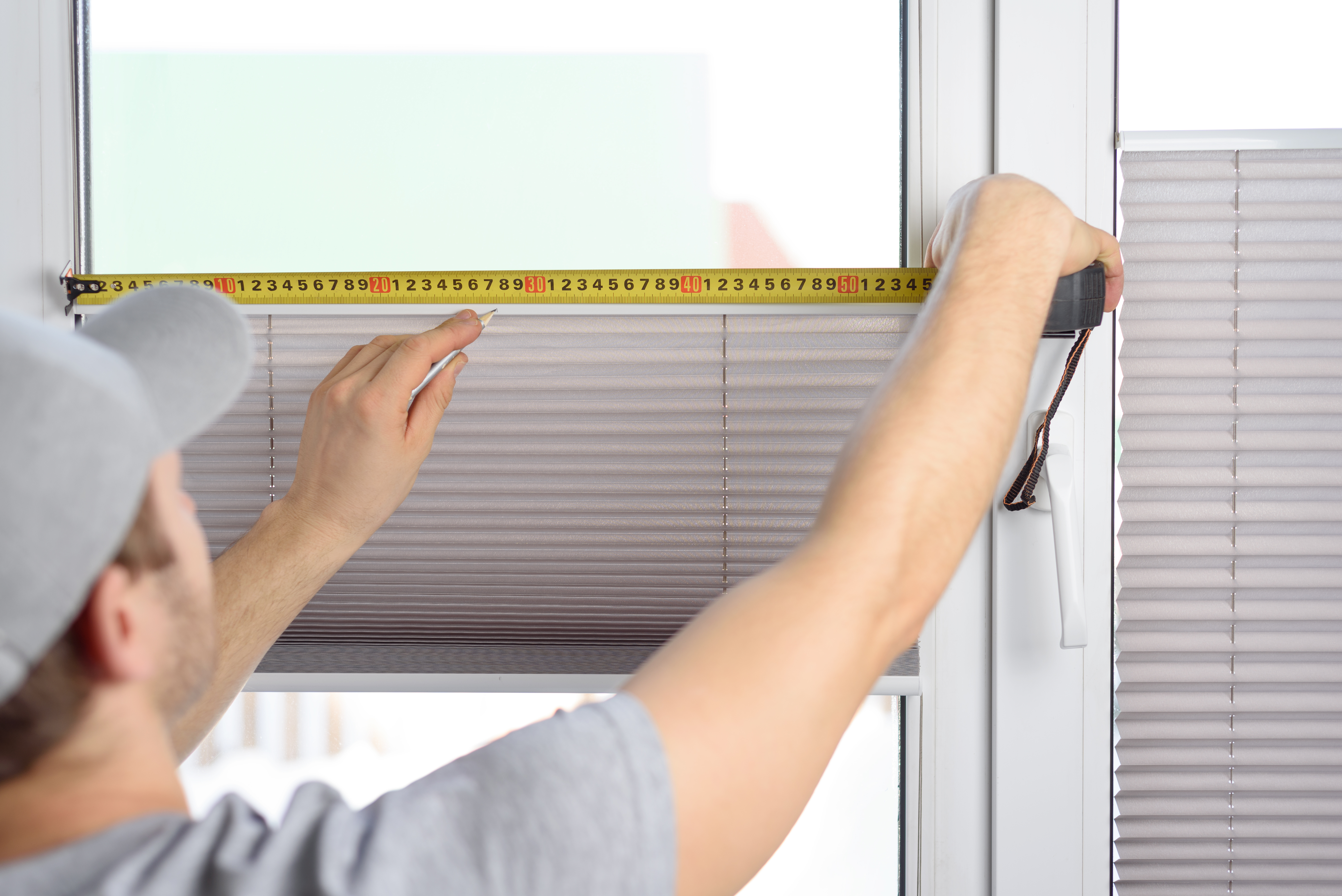Specialist verifying measurements